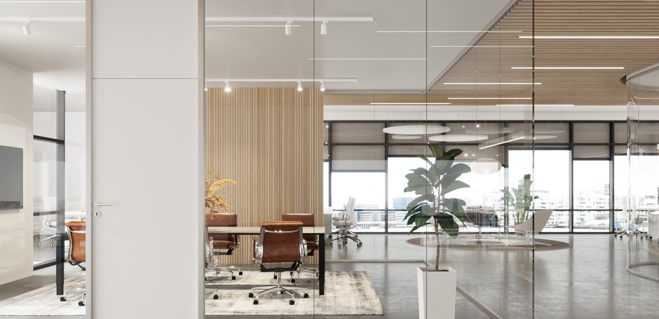Et lyst og moderne kontorområde med glasvægge med en hvid trædør